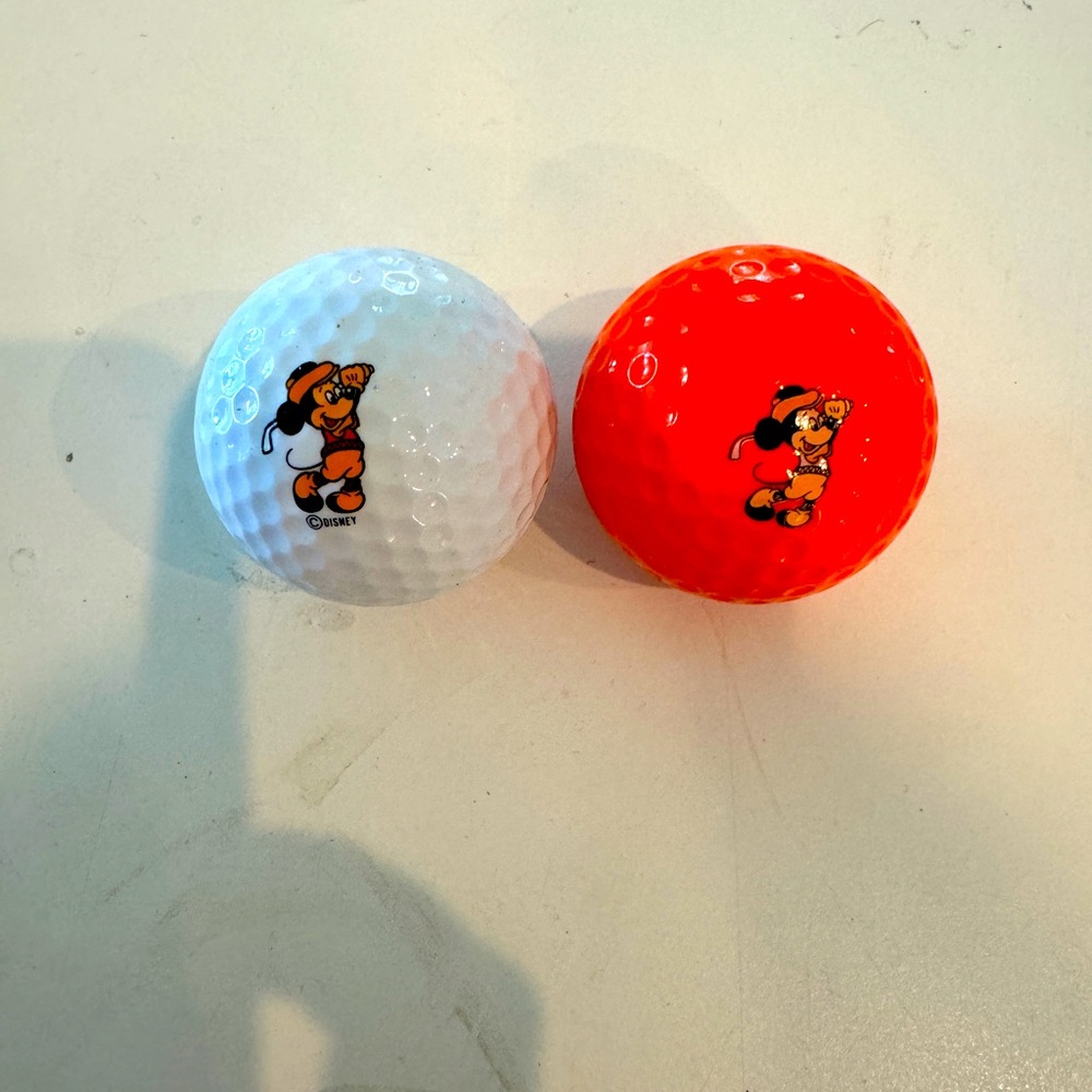 Walt Disney Mickey Golfballs 32 White and 1 Orange per pack Golfer Mickey